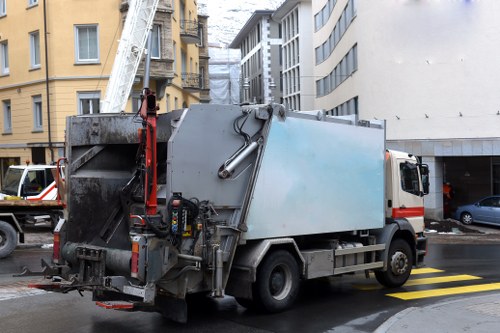 Quote specialist measuring volume for a skip