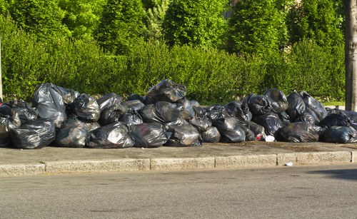 Compost bins and recycling containers for eco-friendly garden waste management.